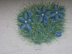 Peinture sur la façade du chalet à  Roch Dessus